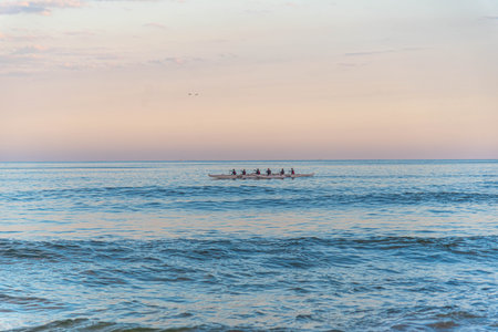 Rowing team on Gamboa beach, Santa Catarina, Brazil