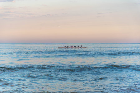 Rowing team on Gamboa beach, Santa Catarina, Brazil
