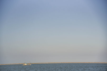 Tugboat in the harbor channel of the Port of Rio Grande, RS, Brazil