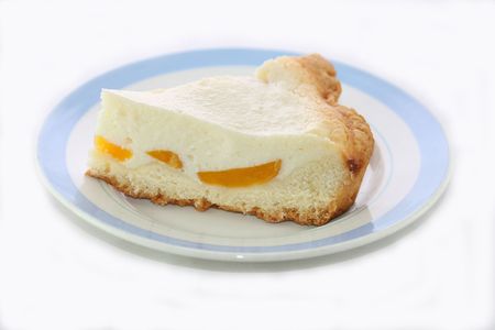 Cheesecake with apricots on a white backgroundの写真素材