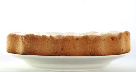 Cheesecake with apricots on a white backgroundの写真素材
