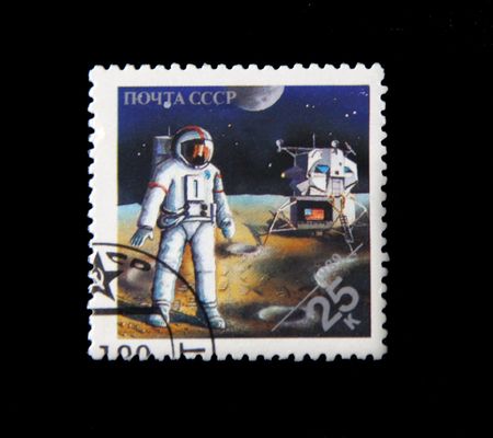 astronaut and the spacecraft on the moon,postage stampの写真素材