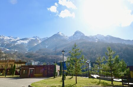 city landscape on a background of mountains in spring
