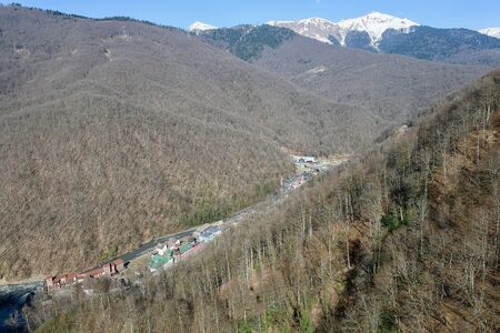 city landscape on a background of mountains in spring