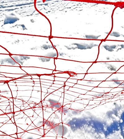 red rope net on snow backgroundの写真素材