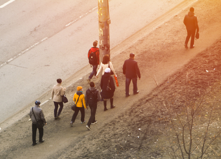 a group of people going to work with a quadrocopterの写真素材