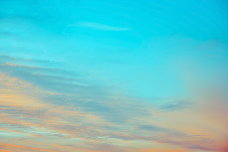 blue and orange sky clouds at sunset or sunriseの写真素材