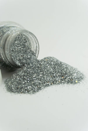 a bottle overflow of glitterの写真素材