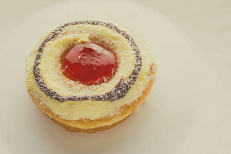 Donut on a white plate, donut with white backgroundの写真素材