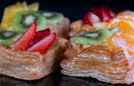 Delicious puff pastry with cream and fruitsの写真素材