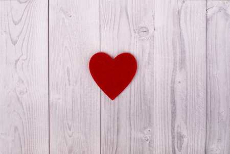 red heart on a grey and white wooden background. valentine's day conceptの写真素材