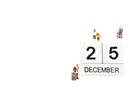 Santa Claus meeting children in Christmas day on the white background, Christmas and Holiday conceptの写真素材