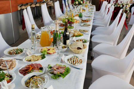served table with food and drinks in the restaurant