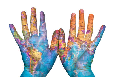 the map of the earth on his handsの写真素材