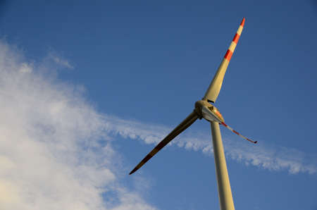 high windmill and beautiful blue sky in summer