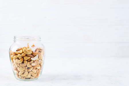 Cashew nuts in a jar. Set of cashew nut isolated on white background