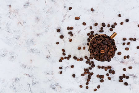 Coffee beans on white background. Top view. Flat lay