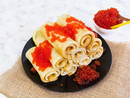 Pancakes with red caviar.の写真素材