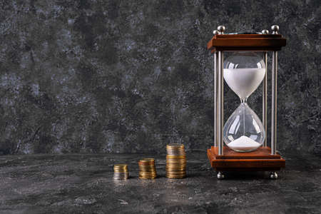 Money, coin, time saver. Business concept. Crisis, devaluation, save money.
