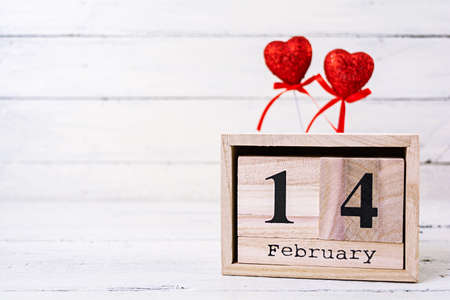 Valentine day. Wooden calendar with February 14 on it.の写真素材