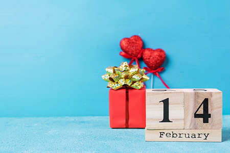 Valentine day. Wooden calendar with February 14 on it.