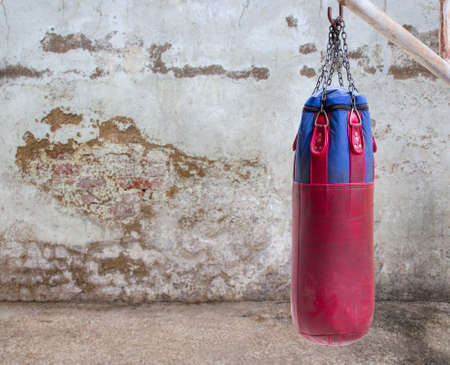 Boxing bag on grunge background for any designの写真素材