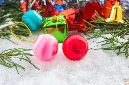 Christmas ball and christmas decorations in the snow. Christmas concept.の写真素材