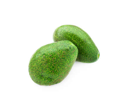 Fresh green avocado on a white background