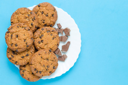 Cookies with chocolate on a blue background.Homemade cake.