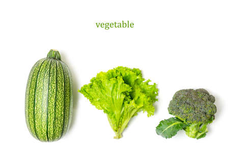 Courgettes, broccoli and salad on white background.Green, healthy vegetables with vitamins.Close up.の写真素材