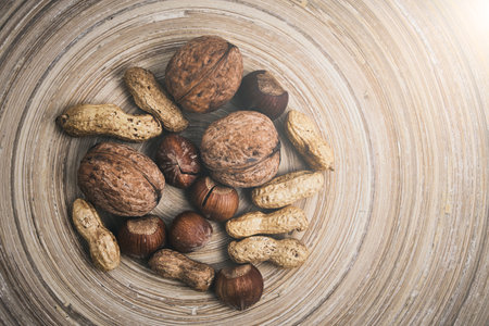 Walnuts, hazelnuts and peanuts.Nuts close-up view from above, healthy and healthy food
