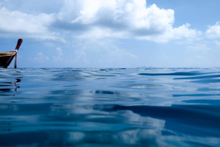 Blue sea wave ripple with sky beautiful backgroundの写真素材