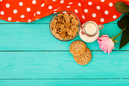 Breakfast on a blue wooden table. Tablecloth in polka dots and mothers day. Copy spaceの写真素材