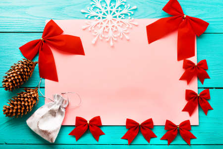 Christmas card with copy space on blue wooden background. Top viewの写真素材