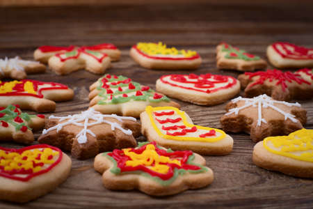 Christmas cookies on brown wooden table. Top view and mock up.