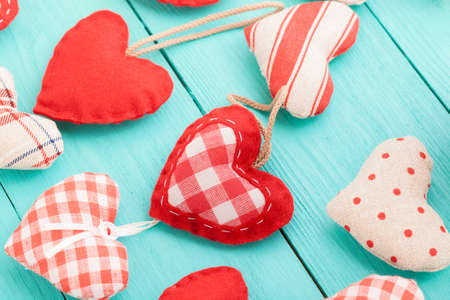 Romantic accessories and copy space on blue wooden background.の写真素材