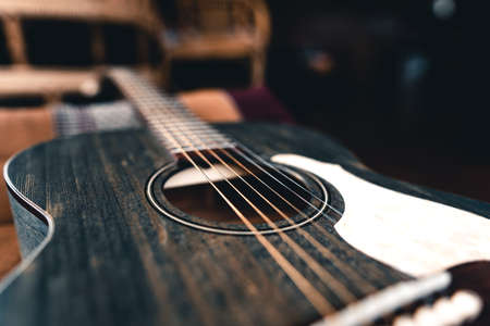 Wooden guitar On Hardwood Floorの写真素材