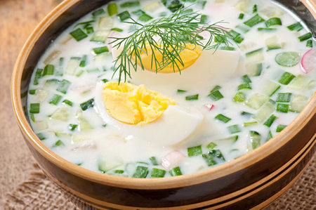 Cold vegetable kefir soup with eggs and greensの写真素材