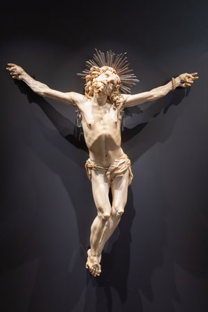 Jesus Christ - Old crucifix, Catholic Church, on black background with copy spaceの写真素材