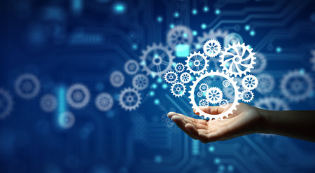 Hand holding cogwheels. Wireframe light connection and Circuit converging point background. Business...