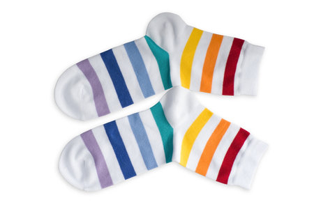 white socks in stripes of different colors on a white background, isolate.の写真素材