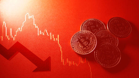 Bitcoin crypto currency isolated on red background. Red market concept.の写真素材