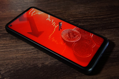Bitcoin crypto currency in smartphone. Red market.