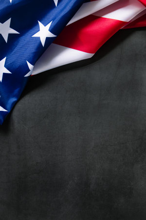 American flag on a dark concrete background. USA national holidays concept. Independence Day, Memorial Day, Labor Day. Place for your text.の写真素材