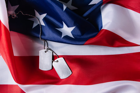 American flag and military dog tags close up. USA Memorial Day concept.の写真素材