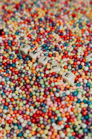 Super colorful mock up with happy and fun concept, colorful balls with Smile written in dices, background, stunning, wonderfulの写真素材