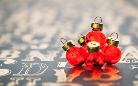 Christams red glass decoration ball on vintage type pattern table background.holiday greeting card with copy spaceの写真素材