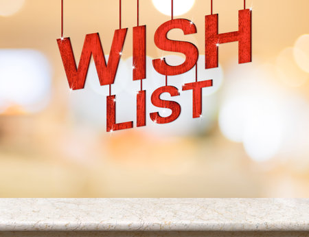Wish list word hanging over marble table with blurred bokeh light background,Holiday card.の写真素材