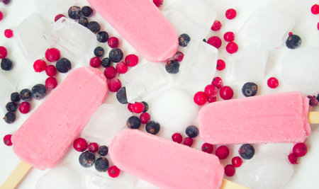 Ice creams with fruit and ice on white background