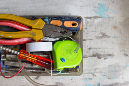 Various tools in the box, on white background